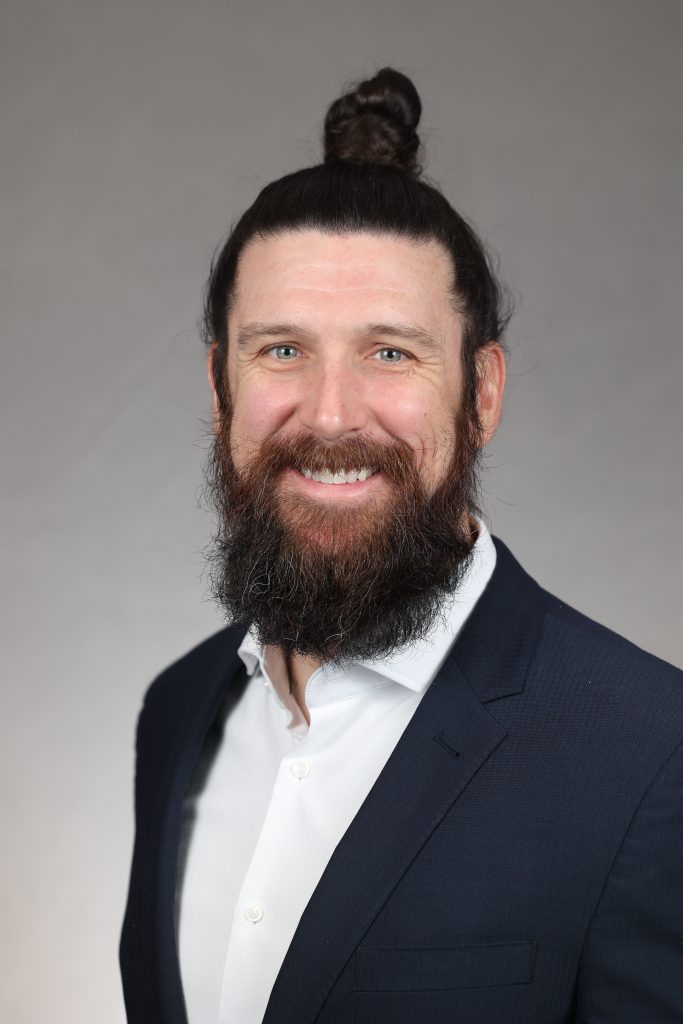 Professional headshot of Ryan Welch, Assistant Professor