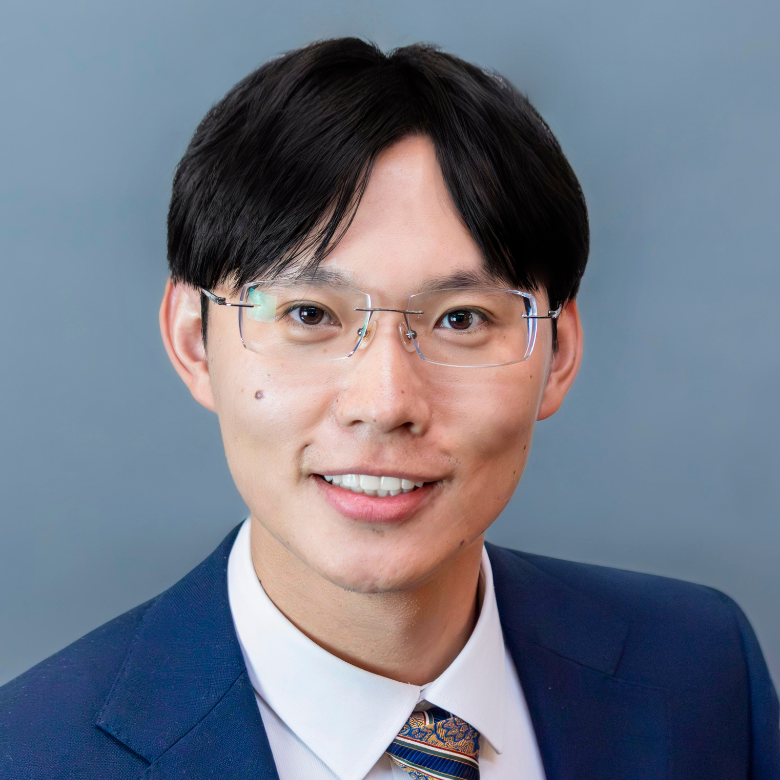 Professional headshot of Zhen Han
